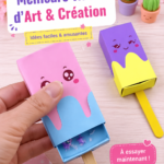 Un enfant souriant réalisant un projet de bricolage coloré avec des fournitures créatives.