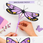 Un papillon coloré en papier qui vole, réalisé par des enfants lors d'une activité manuelle.