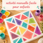 Un enfant en train de peindre avec des bandes de scotch et de la peinture colorée sur une feuille.